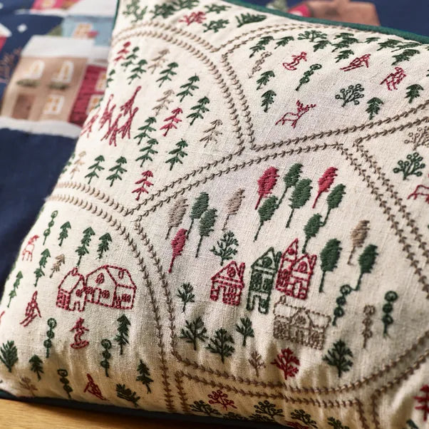 CHRISTMAS SKI VILLAGE FILLED CUSHION 30X50CM